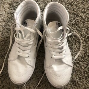 White platform high top vans